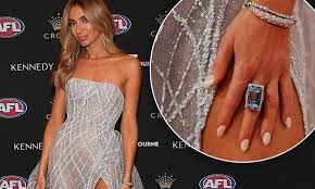 Baked beans wedding cake leaves onlookers 'queasy' a number of wild theories emerged but sharp onlookers quickly picked up on the major giveaway that his 'solo' trip was far from that. Nadia Bartel Sports Impressive New 25 000 Sparkler At Afl Brownlow Medal 2019 Daily Mail Online