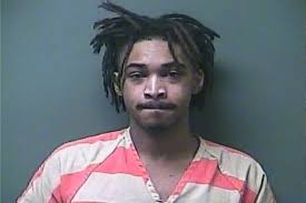 Two Michigan City residents arrested for illegally possessing handguns