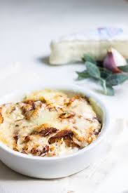 Tartiflette The Ultimate Cheesy Potato Bake With Bacons And Creamy Brie Recipe Via Monpetitfour Com Cheesy Potato Bake Cheesy Potatoes Foodie