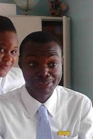 Teacher Jamie Boyington with Xavier, Maya and Brianna