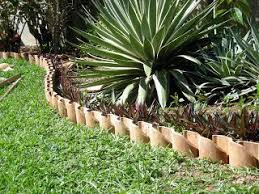Scrap wood used as garden edging emphasizing your garden through wood is a recipe for success. 32 Gorgeous Suggestions For Edging Your Garden