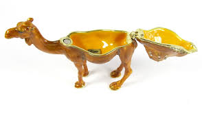 The djinn made a magic that puffed up the camels back into a humph (or hump) and condemned him to work for three days without eating, living on his hump instead, to make up for the days he had missed. Buy Australian Camel Single Hump Trinket Box Or Figurine