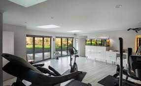 The beauty of having your own gym is that you have the only say in what's on the tv or the music choice. Why Should I Convert My Garage Builders In Surrey Refresh Renovations United Kingdom