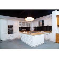 There are lots of options on the market for kitchen countertops, but 10 materials comprise the majority of countertops in residential kitchens. China Pure White Pvc Kitchen Cabinet With Wooden Table Top China Pvc Solid Wood Kitchen