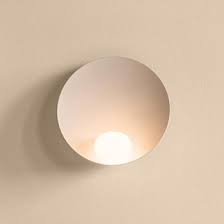 Sconces and swing arm wall lamps are an ideal way to add layers of ambient light to many rooms throughout a home, such as hallways and entryways. Vibia Wall Lamps