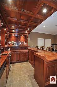 Close Up Of Bar With Coffered Ceiling And Tile Floor English Pub Style Pub Style Basement Bar Basement Remodeling Kountry Kitchen