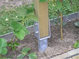 Create an attached carport that ties into the roof of the main structure by using a deck railing and a i want to add an attached carport to my shop or house. Post Support Best Method Of Protecting Your Post