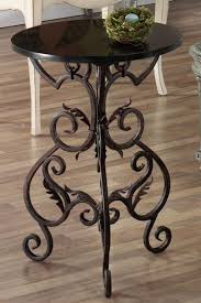 Metal dining room table and chairs victorian trading company. Your Decorating Resource For Furniture Rugs And Decor Wrought Iron Furniture Wrought Iron Decor Iron Furniture