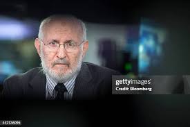 Mario Blejer, vice president of Banco Hipotecario SA, poses for a... News  Photo