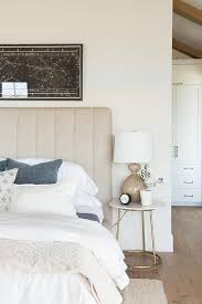 Rustically beautiful knots, burls, whorls and dings add to the inherent beauty of this piece, which is detailed with a… Aerin Culloden Lamp Atop A Round Marble And Brass Bedside Table Doubling As A Nightstand Beside A Beig Cozy Bedroom Design Bedroom Design Modern Master Bedroom