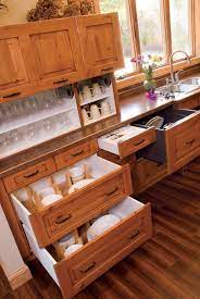 The bathroom storage cabinet has 4 support feet at the bottom. Specialty Kitchen Cabinet Storage Kitchen And Bath Remodeling Mn