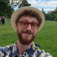 Con doing his bit to spread the word about SOS whilst drinking a huuuuge  gin and tonic at the roof top bar in our hotel in Seville!