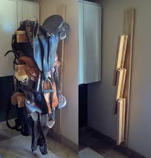 This wall mounted saddle rack is perfect and has storage space for grooming supplies! Diy Sturdy Collapsible Saddle Rack Teediddlydee