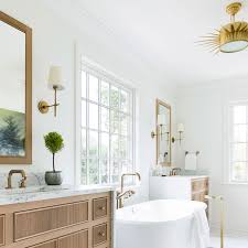 This bathroom vanity requires some thick pieces of plywood, wood boards, a large mirror, and vessel sinks. Bathroom Trend Warm Wood Vanities Becki Owens
