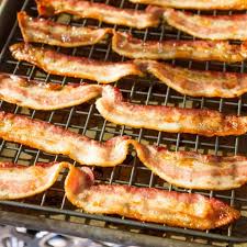 Line a baking sheet with parchment paper. How To Bake Bacon No Mess Unsophisticook
