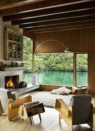 wasserfall haus wohnzimmer holz mobel kamin stuhle decke balken haus innenarchitektur haus und wohnen architektur und wohnen