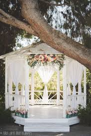 The colors are light/dark blue, baby pink, and yellow. Diy Ideas For Decorating The Perfect Wedding Gazebo The Secret Garden