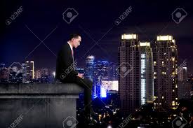 Maybe you would like to learn more about one of these? Asian Business Man Feeling Stress Sit On The Top Of The Building At Night Time Stock Photo Picture And Royalty Free Image Image 44724627