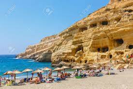 The settlers back then carved a set of caves in the soft rock of the mountain. Crete Island Greece June 09 2017 Panorama Of Matala Beach Stock Photo Picture And Royalty Free Image Image 84096533