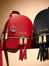 Retour facile et gratuit, paiements sacs à dos et bananes. Mini Sac A Dos Rhea En Cuir Perfore Michael Kors Femme Rouge Vif Moins Cher