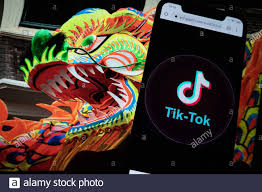 Tiktok App And China Dragon On A Phone Screen Tiktok Is A Chinese Video Sharing Social Networking Service Owned By Bytedance Stock Photo Alamy