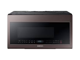 The microwave oven is now an essential part of most kitchens. 2 1 Cu Ft Over The Range Microwave With Sensor Cooking In Fingerprint Resistant Tuscan Stainless Steel Microwave Me21r706bat Aa Samsung Us