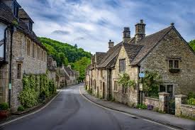 The brick and stone have its own original colour. Free Photo Shot Of Brick Stone Houses On The Main Street Castle Combe Uk