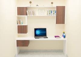Modular Study Unit Offering Cabinets Racks And Drawers Made Up Of Plywood With Laminate Finish The Color Study Table Designs Study Table Wooden Study Table