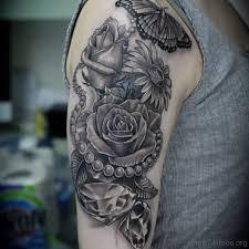 Rose tattoos can also be combined with other types of tattoos such as butterfly tattoos, skull tattoos, and others. Forearm Rose And Butterfly Tattoo Designs
