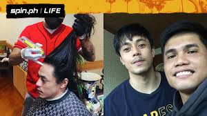 San Miguel guard Terrence Romeo lets go of his long hair