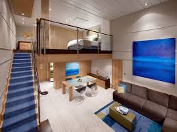 The living area has a double sofa bed, dining room, marble entry, and entertainment center. Suiten Der Allure Of The Seas Kabinenaustattung Guide