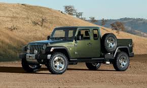 The First Images Of The Jeep Wrangler Pickup Have Emerged Jeep Wrangler Pickup Wrangler Pickup Jeep Gladiator