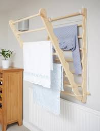 These storage containers can easily hold loose accessories, clothes or other objects that may be tricky to find a spot for. Brambly Cottage Wall Mounted Drying Rack Wayfair Co Uk Wall Mounted Drying Rack Wall Mounted Clothes Airer Hanging Drying Rack
