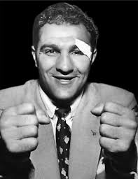 Rocky Marciano 🥊defended his heavyweight title six times before retiring  undefeated. His successful title defenses were against Jersey Joe Walcott,  Roland La Starza, Ezzard Charles (twice), Don Cockell, and Archie Moore.  🥊🥊