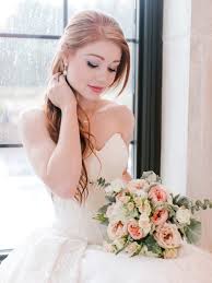 Corded lace appliques lend stunning contrast, and scalloped lace trims the skirt and neckline. Oleg Cassini Classic Bridal Looks From David S Bridal