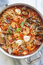 Cook and stir until the tomatoes have softened. 16 Quick And Easy One Pot Pastas Your Whole Family Will Love Mixed Seafood Recipe Seafood Pasta Recipes Seafood Pasta