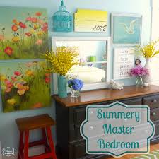 Master bedrooms sometimes double as living spaces, especially when space in your home is tight, so if you've for a beachy, coastal style, paint your walls in a color scheme of blues, greens and whites and dress your bed with bedding and throw pillows in. Summer Master Bedroom A New Gallery Wall And Mixing Pattern On The Bed The Happy Housie