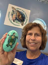 Receiving kindness rocks and wood rounds in Gulf Breeze
