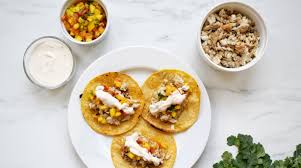 Fish taco topping with mango salsa. Fish Tacos With Mango Salsa And Lime Sauce Experience Life