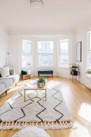 Step Inside The Chic Light Filled Apartment Of Poshmark S Pr Genius Bright Living Room Rugs In Living Room Bright Living Room Decor