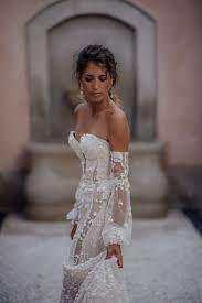 A Closer Look At The Fitted And Fashionable Off The Shoulder Trumpet Camilla Wedding Dress With Its Striking Wedding Dresses Bridal Gowns Flower Girl Dresses