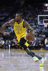 Kevin Durant Of The Golden State Warriors Drives Towards The Basket Golden State Warriors Kevin Durant Nba Champions