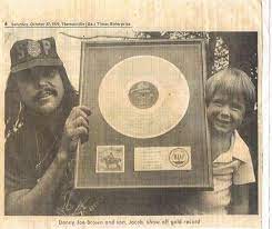 Djb And Oldest Son Jacob Show Off Gold Record From First Album Southern Rock Joe Brown Rock N Play