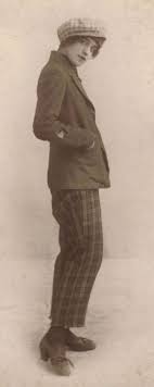 People in 1920s style cocktail dresses at a vintage party. Pin By April Rily Johnson On Photography Inspiration 1920s Women Vintage Lesbian Menswear Inspired Outfit