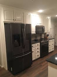 Black Stainless Steel Appliances Steel Gray Counter Tops Benjamin Moore Simply White Cabinets Silver Cuisines Design Armoire De Cuisine Decoration Cuisine