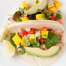 Top it with half a filet of fish, mango and a few torn cilantro leaves. Tilapia Fish Tacos With Mango Salsa Tasty Kitchen A Happy Recipe Community