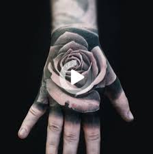 Black And Grey Realism Tattoo Artists London Black And Grey Rose On Hand Black And Grey Realism Tattoo Of Rose On Hand By Alo Loco London In 2020 Hand Tattoos Black And Grey Tattoos Realism Tattoo