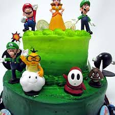 The icing took me a long time but i did it over a few days; Buy Nintendo Mario Brothers Birthday Party 22 Piece Mario Birthday Cake Topper Featuring Mario Luigi Bullet Toad Mushroom Goomba Koopa Shy Bomb Lakitu Spiny Mario Coins Large Bomb And 6 Mario 1