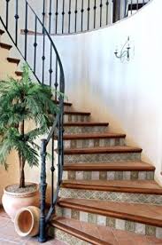Tile Staircase In A Combination Of Wood Terracotta Neutral Colored Tiles On Risers Staircase Stairs Tile Riser Mexi Tiled Staircase Tile Stairs Stairs
