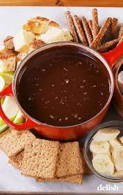 This Decadent Fondue Uses Two Kinds Of Chocolate Recipe Chocolate Fondue Recipe Easy Chocolate Fondue Recipe Recipes